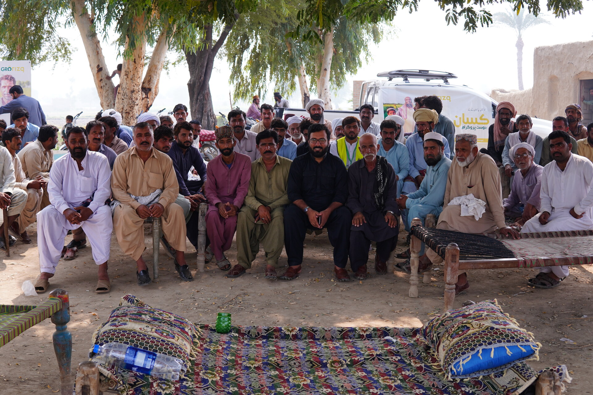 GroRizq Contract Farming Community & Kisan Dost Program Smallholder farmers gathering with GroRizq Kisan Dost Program field operations team